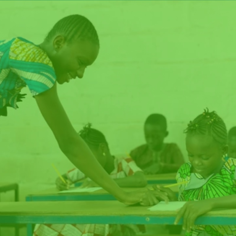 teacher helping student